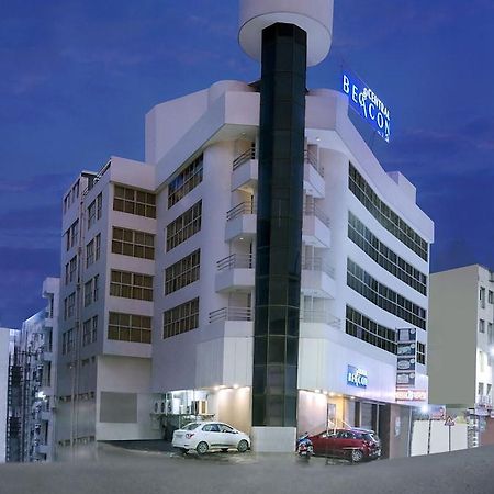 Central Beacon Hotel Surat Bagian luar foto